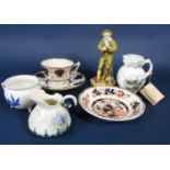 A collection of Worcester ceramics including a 19th century Hadley type Worcester figure of a seated