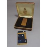 A S. T. Dupont lacque de chine cigarette lighter no IKOH 45, together with a gold cross plated