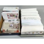 Two boxes of First Day Covers from The Channel Islands and Isle Of Man (approximately 590) all
