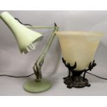 Anglepoise lamp with further glass bell shaped lamp upon cast iron angels