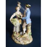 A 19th century Meissen figure group of male and female characters accompanied by a bird and a dog,