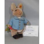 Peter Rabbit 100 year anniversary figure 660481 by Steiff, serial no 1902, with pin in ear and