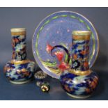 A pair of Losolware Chartley lustre vases with globular bodies and drawn necks and painted and