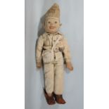 A 1930's'/40's Merrythought fabric faced soldier doll with painted features, in pale khaki cotton