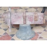 A reclaimed antique turret bell with original wooden beam mount with iron fittings, (AF, lacks