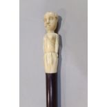Antique malacca shafted walking stick, the ivory knop in the form of a naive standing woman