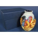 A boxed Moorcroft vase in the Fowlers Farmyard Chicken pattern, with various impressed and painted