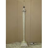 A contemporary lamp standard of column form with painted finish