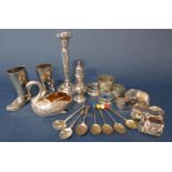 A mixed lot of silver and silver plate to include various napkin rings, cruet items, etc