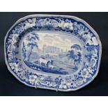 An early 19th century blue and white printed meat plate showing Malmesbury Abbey within a floral