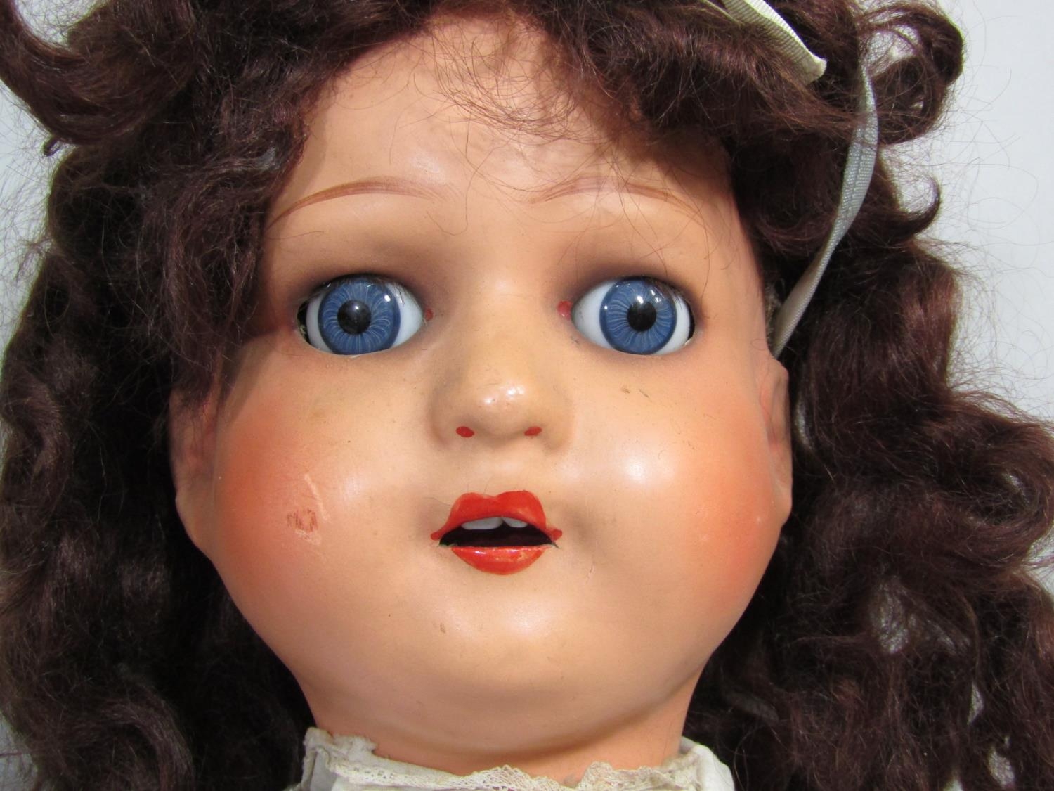 2 early 20th century large composition head dolls, both with closing blue eyes, the taller doll 75cm - Image 2 of 5