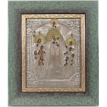 An eastern European icon, in pierced and embossed yellow and white metal with painted details to the