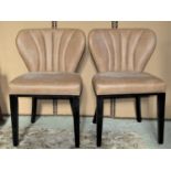 A set of six contemporary light brown suede leather upholstered dining chairs with fan/shell