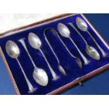 Cased suite of six silver Albany handled and scallop bowled teaspoons, with a pair of sugar nips,