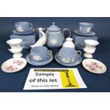 A quantity of Wedgwood blue ground jasperwares (mostly boxed) including a teapot and cover of fluted