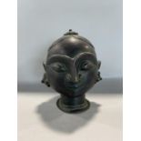 Far eastern patinated bronze head of a female theatrical character 15cm high