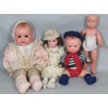 4 bisque head dolls for restoration including an early 20th century doll (no eyes) with open mouth