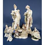 A pair of tall early 19th century continental bisque figures in the early 19th century manner of