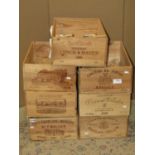 Seven wooden wine crates, all with printed and incised lettering to include Chateau Du Tertre,