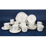 A collection of Royal Doulton Morning Star pattern teawares comprising milk jug, sugar bowl, eight