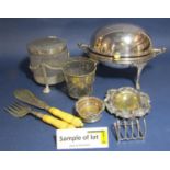 A large collection of silver plated items to include lidded tureens, breakfast dishes, biscuit