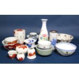A collection of oriental ceramics including a four sectional stacking box of circular form with