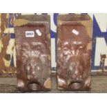 A pair of unusual salt glazed stoneware architectural bricks with lions mask water spouts, 30cm high