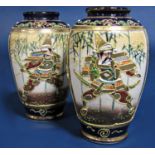 A pair of small late 19th century Satsuma vases with painted and gilded warrior detail and painted