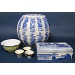 An oriental blue and white jar of lobed form,(missing lid) 23.5 cm tall approximately, an oriental