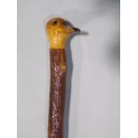 Rustic walking stick with carved duck head knop