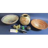 A collection of studio pottery wares of various designs including three open bowls, with painted and