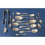 A collection of fourteen various silver spoons to include apostle examples and others, together with