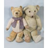 2 early to mid 20th century teddy bears the larger probably by Chiltern, both with glass eyes,