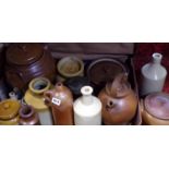 A large collection of mainly stoneware vessels