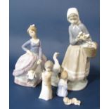 A Collection of Lladro Daisa models including a girl with geese, a young girl with parasol and a