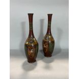 A pair of cloisonné bottle shaped vases, with bird and floral detail (1 af), 31cm high