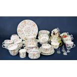 A collection of Minton Haddon Hall pattern wares comprising ginger jar and cover, milk jug,