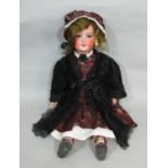 Bisque head doll made by SFBJ with jointed composition body, closing blue eyes, open mouth with 4