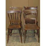 Four Windsor elm and beechwood kitchen chairs of varying design