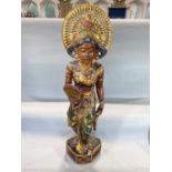 Carved eastern floorstanding figure of a lady in ceremonial dress 101cm high