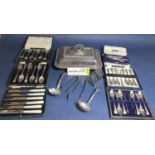 A collection of cased silver plated cutlery sets, mainly spoon and knife sets, together with some