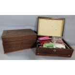 An Indian work box with intricately carved detail of typical scrolling foliage, together with a