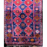 Good quality full pile Turkaman runner with geometric central navy blue medallions, further