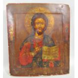 19th century eastern European school - Half length icon of Christ with hand raised, oil on curved