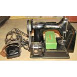 A vintage Singer electric powered sewing machine with combined light and pedal controller to include