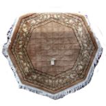Chinese wool relief octagonal rug with raised diaper decoration and floral borders, biscuit