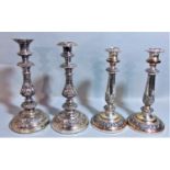 Pair of antique good quality Sheffield plated candlesticks, the baluster columns with cast