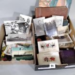 A mixed collection of ephemera to include a quantity of mixed postcards, photograph albums, a