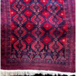 Good quality Turkoman Bokhara runner/rug with intricate geometric medallion decoration and navy blue