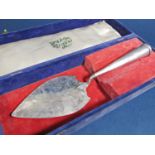Interesting good quality Indian white metal (untested) presentation trowel with canon handle, the